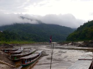 boarding the slowboat after a night in pakbeng.