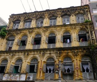 the most interesting sights in yangon were the decaying edifices of colonial british buildings.